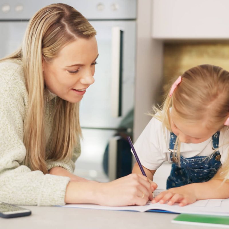 education mother and learning child writing or drawing for kindergarten school homework or project