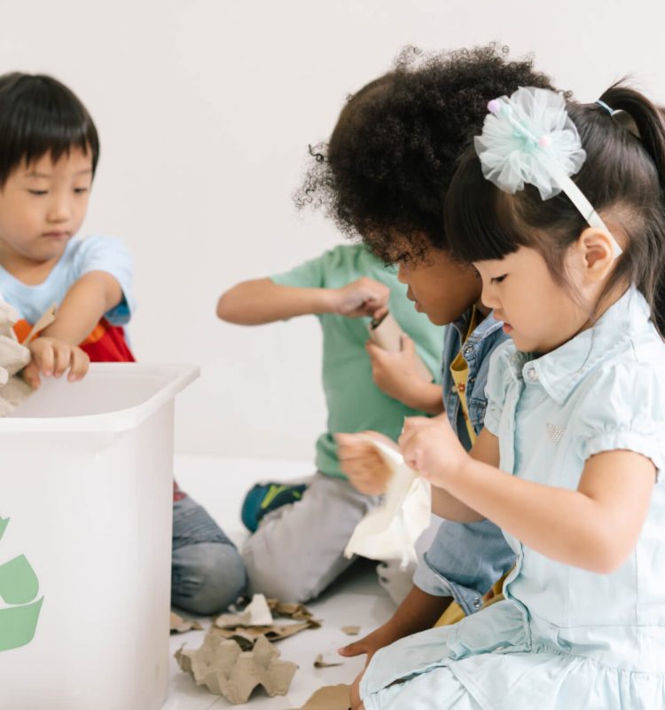 group of adorable kids school kindergarten learning biology recycle environment in classroom